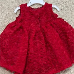 Two fancy 6-9 month dresses.